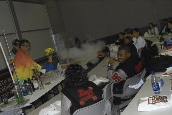 As colorful and exciting an individual as his trademark tie-dyed lab coat, Dr. John Hogg and the Chemistry Road Show program he created introduced more than 2,000 people each year to the wonders of chemistry, physics and general science with the help of fire, explosions, weird polymers and super cold materials.